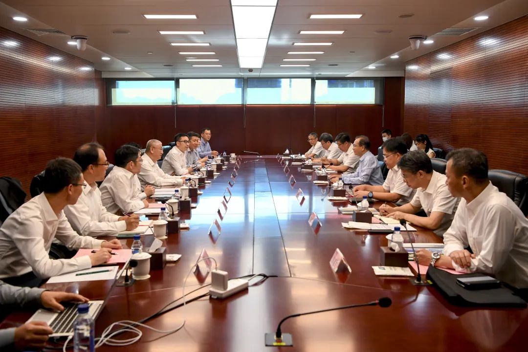 華電集團黨組書記、董事長江毅會見隆基綠能總裁李振國