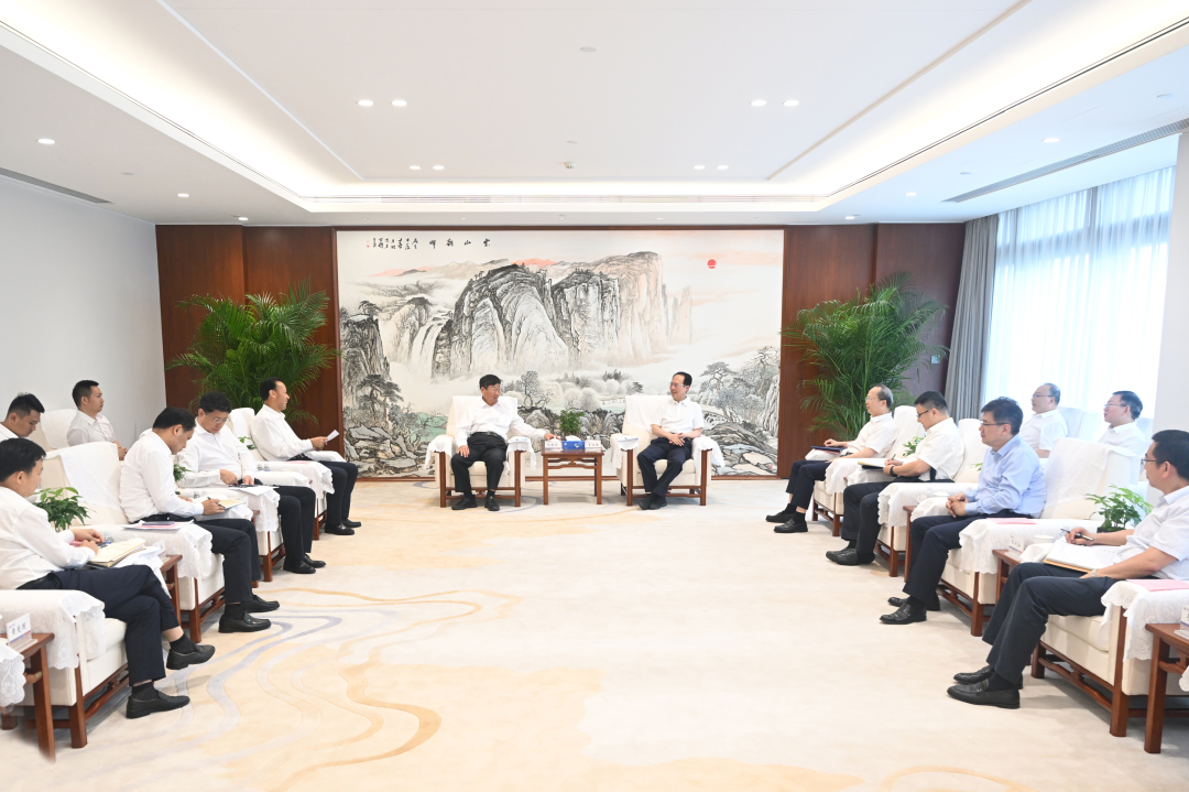 中國電建黨委書記、董事長丁焰章與中國三峽集團董事長、黨組書記劉偉平會談
